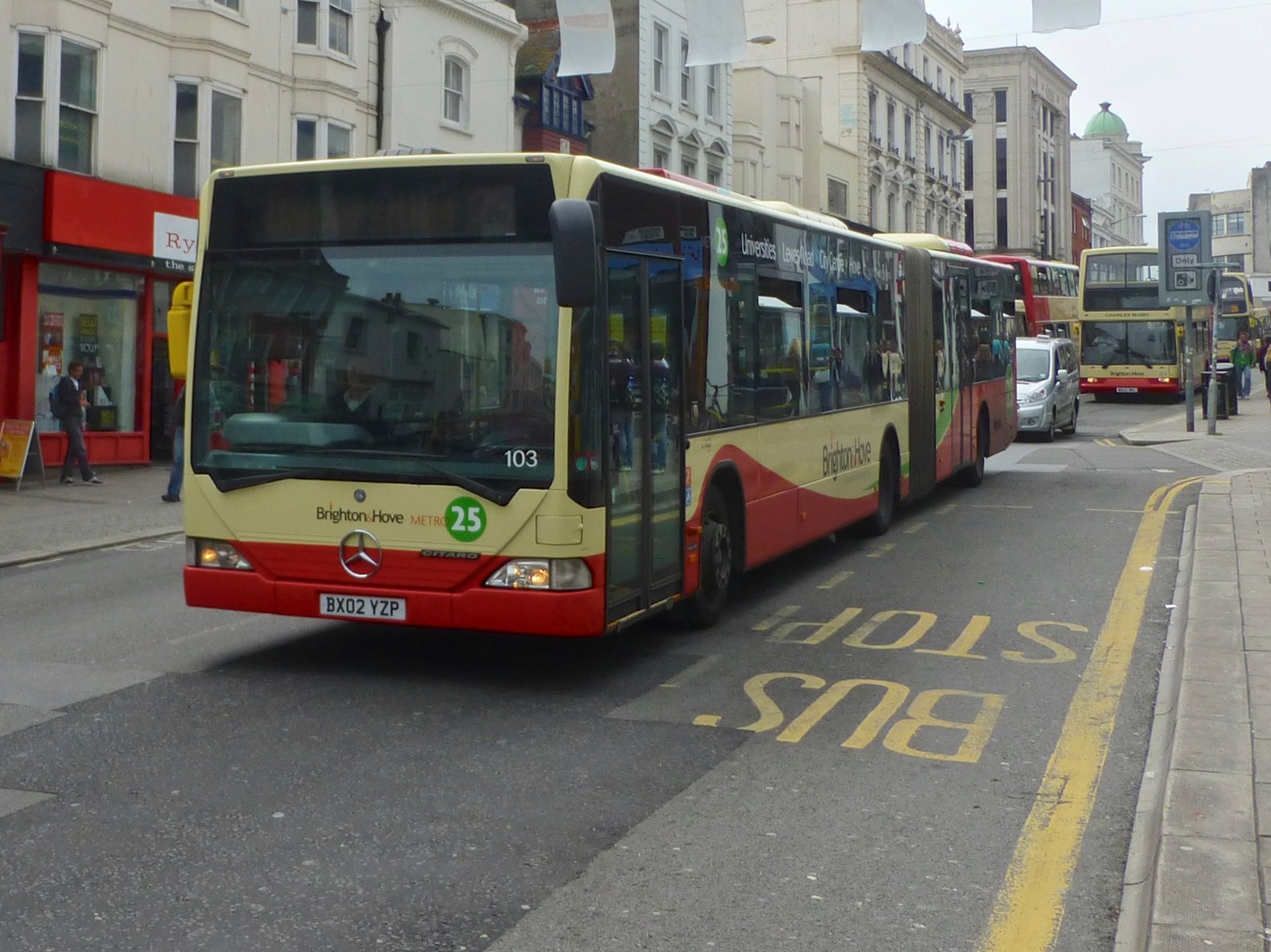 Brighton & Hove route 25 bus travelling down North Street in Brighton