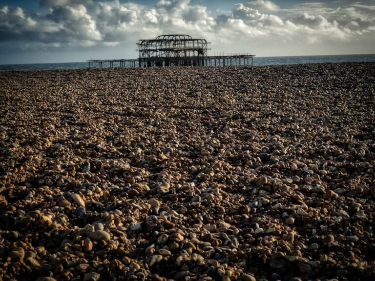 Brighton beach and West Pier under a cloudy sky, used as an illustrative image for the Madeira Terrace restoration update