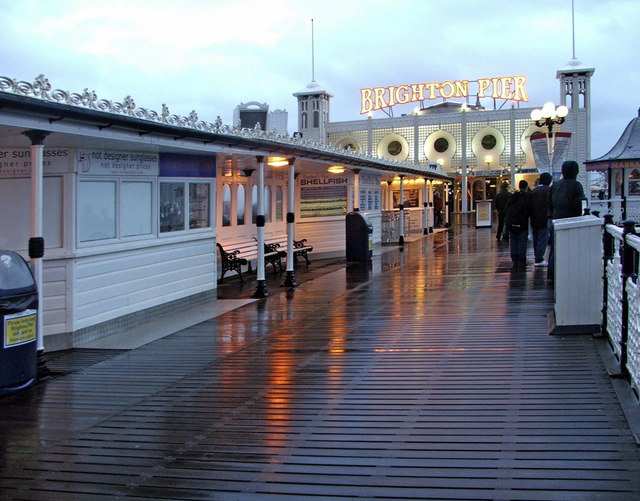 Wet decking on Brighton Pier on 6 November 2005, archive photograph, not current weather.